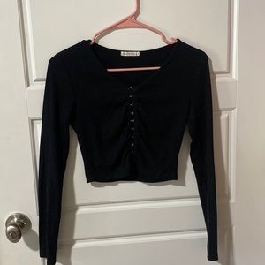 Cropped long sleeve black top